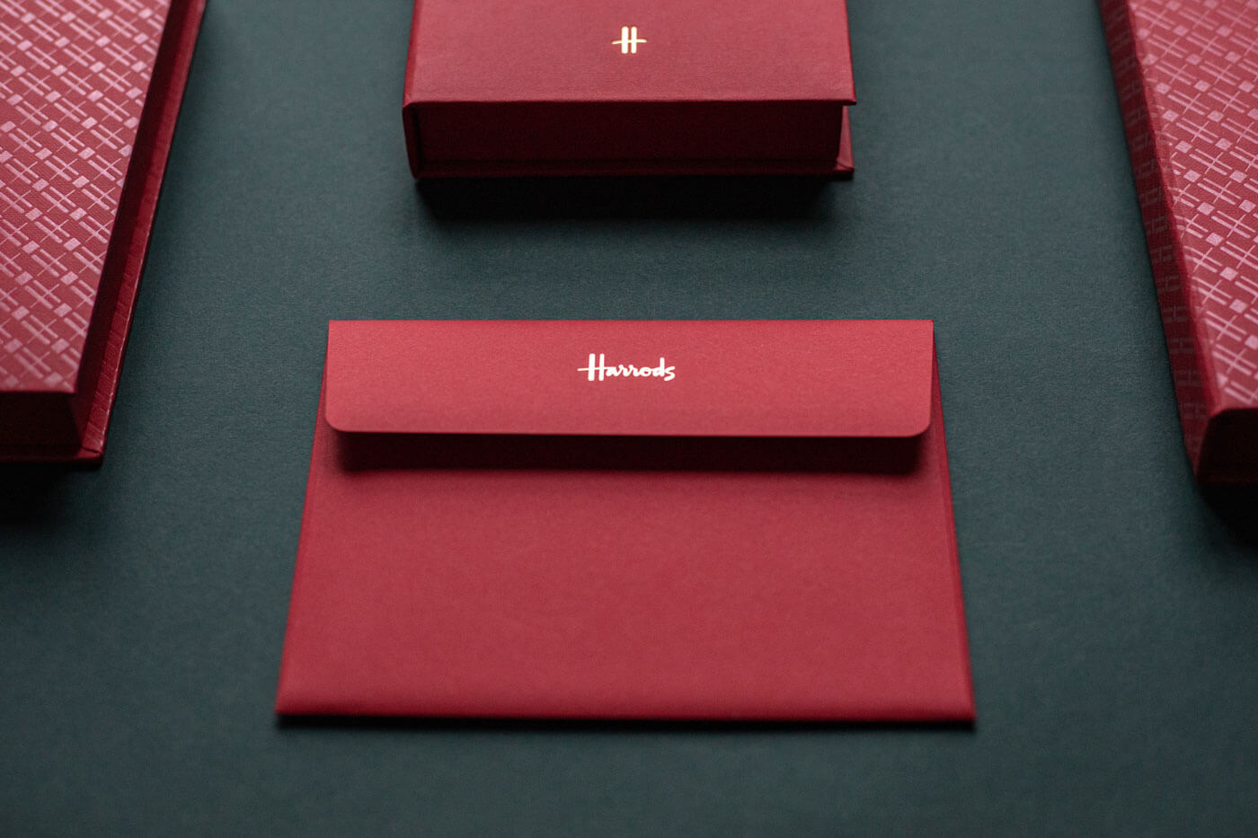 luxury red envelopes with harrods gold foiled logo
