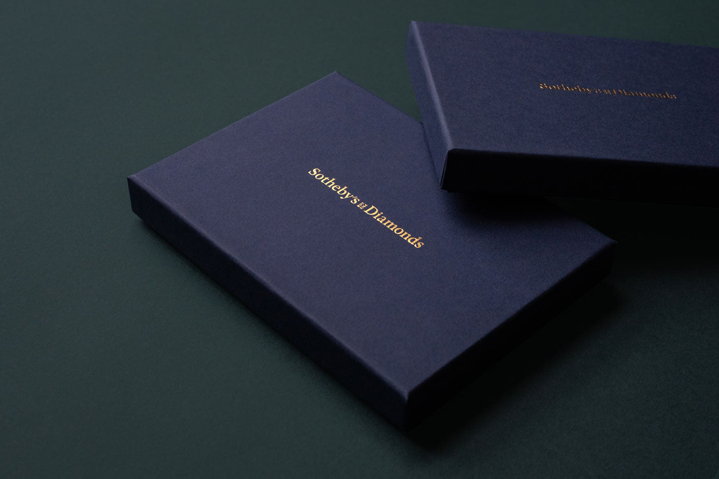 bespoke boxes for sothebys navy and gold printed