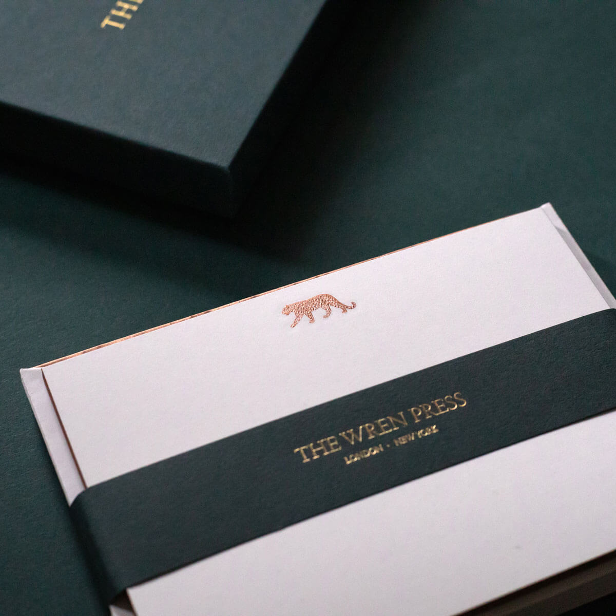 luxury writing cards with lined envelopes with a bronze engraved leopard