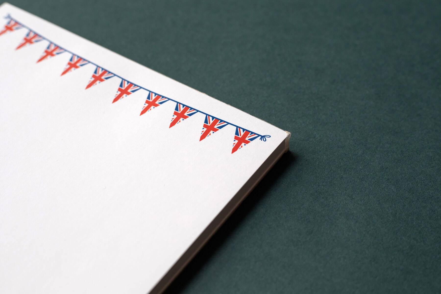 a printed notepad with a red blue and white union jack flag bunting design