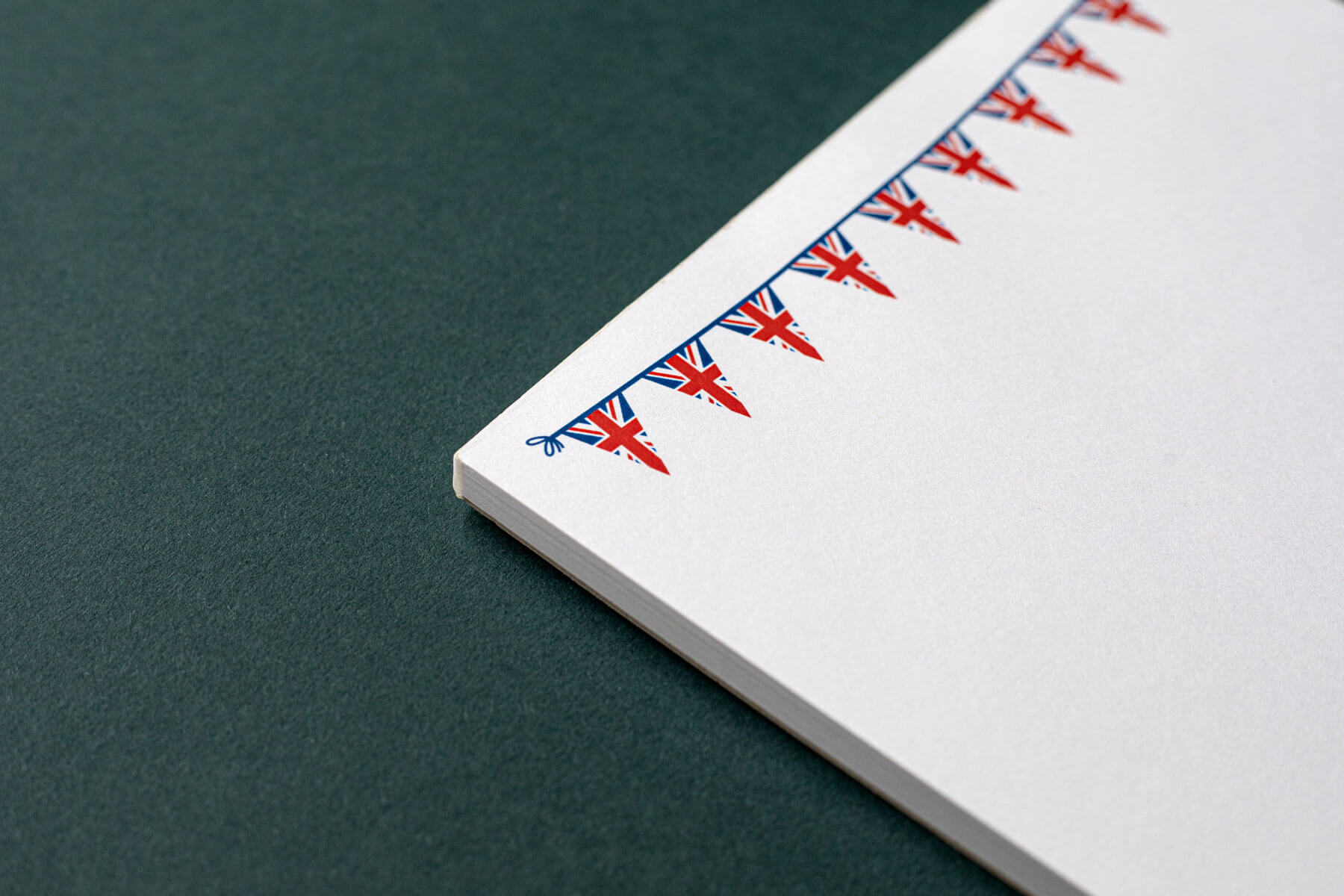 a printed notepad with a union jack flag bunting design